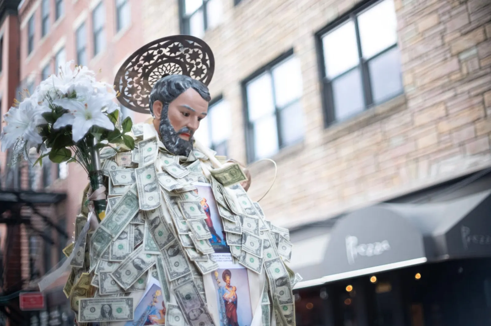 Saint Joseph statue with offerings